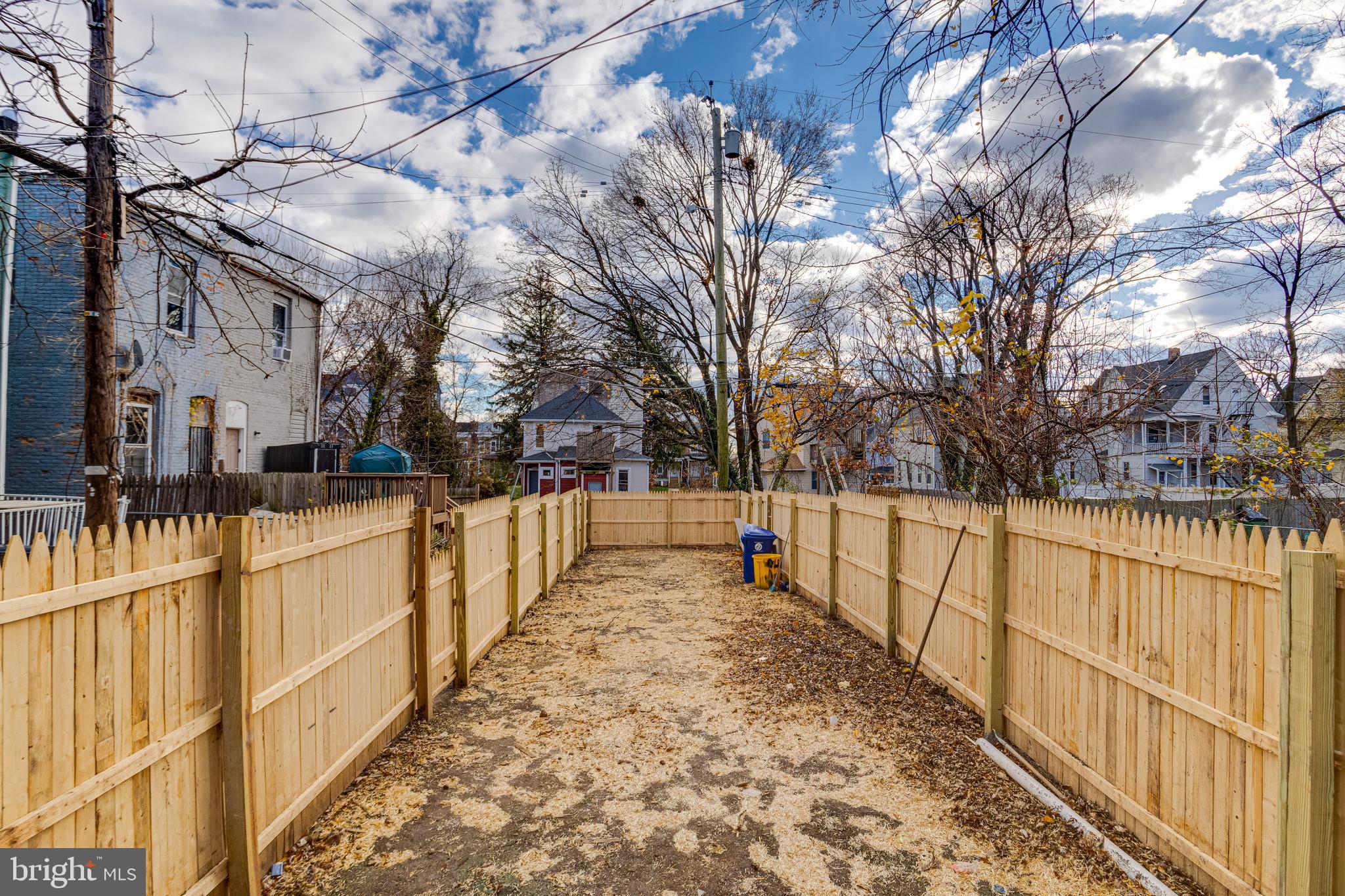3015 Windsor Avenue Baltimore, MD 21216 - Photo 81 of 84 a view of a house with wooden fence