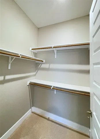 a view of a room with racks on the wall