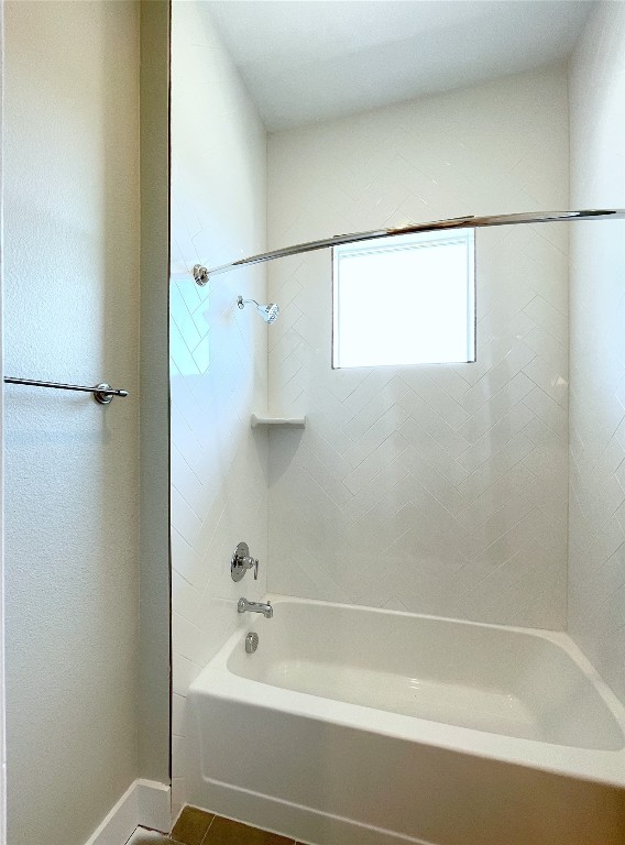 4325 Jackson Avenue, Unit 2301 Austin, TX 78731 - Photo 14 of 31 a bathroom with a shower and a bath tub