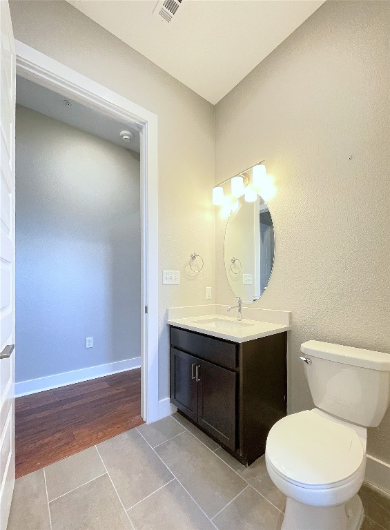 4325 Jackson Avenue, Unit 2301 Austin, TX 78731 - Photo 15 of 31 a bathroom with a toilet sink and mirror