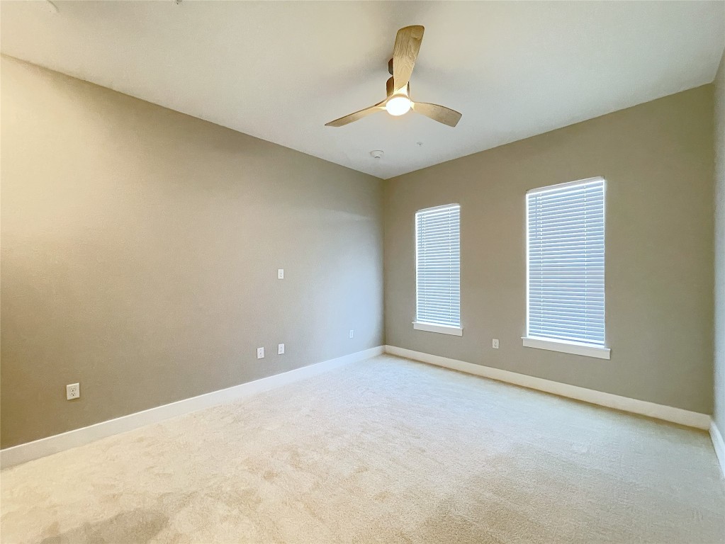 4325 Jackson Avenue, Unit 2301 Austin, TX 78731 - Photo 16 of 31 a view of an empty room with a window