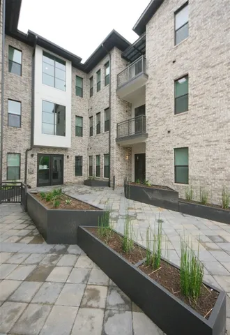 a view of a white building among the ocean