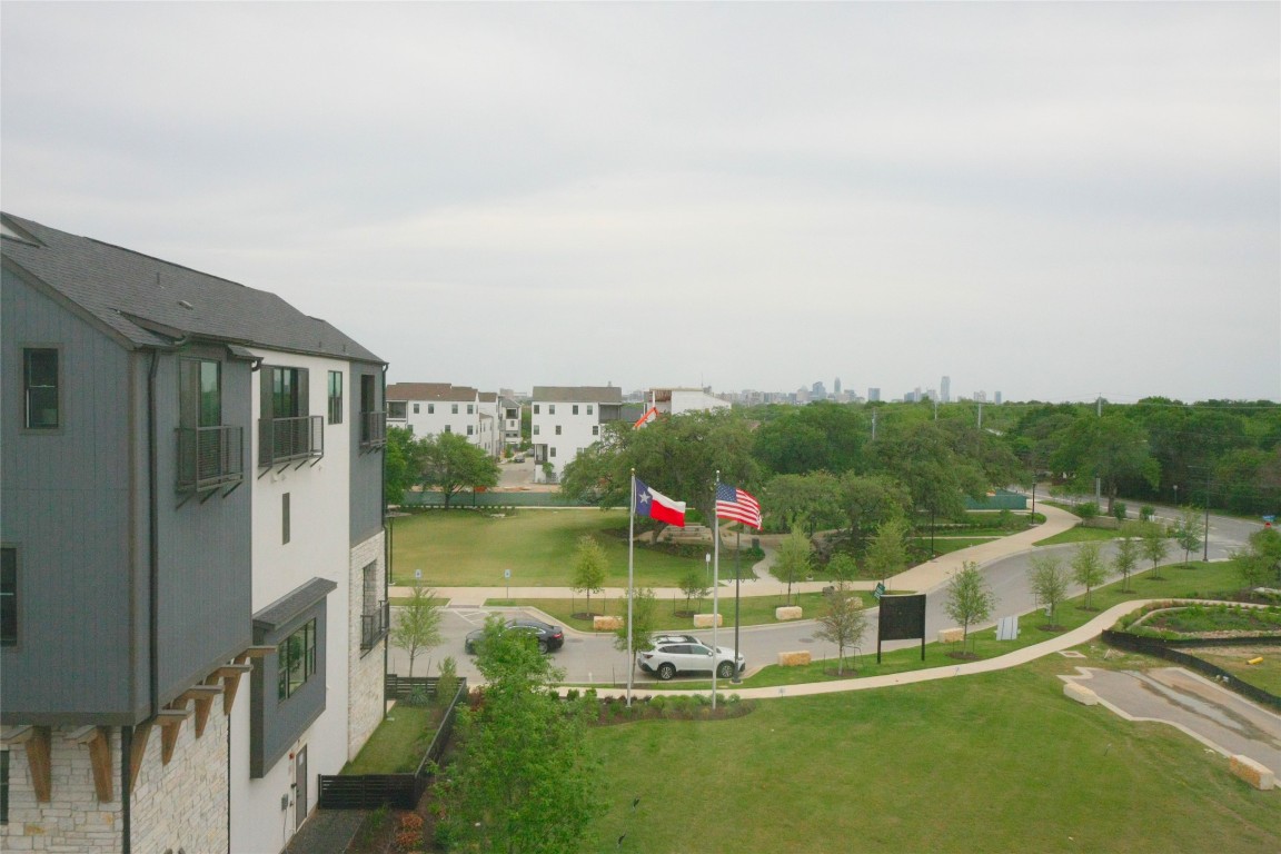 4325 Jackson Avenue, Unit 2301 Austin, TX 78731 - Photo 30 of 31 a view of a swimming pool with a yard