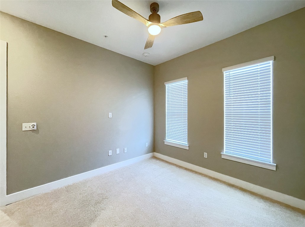 4325 Jackson Avenue, Unit 2301 Austin, TX 78731 - Photo 10 of 31 a view of an empty room with a window