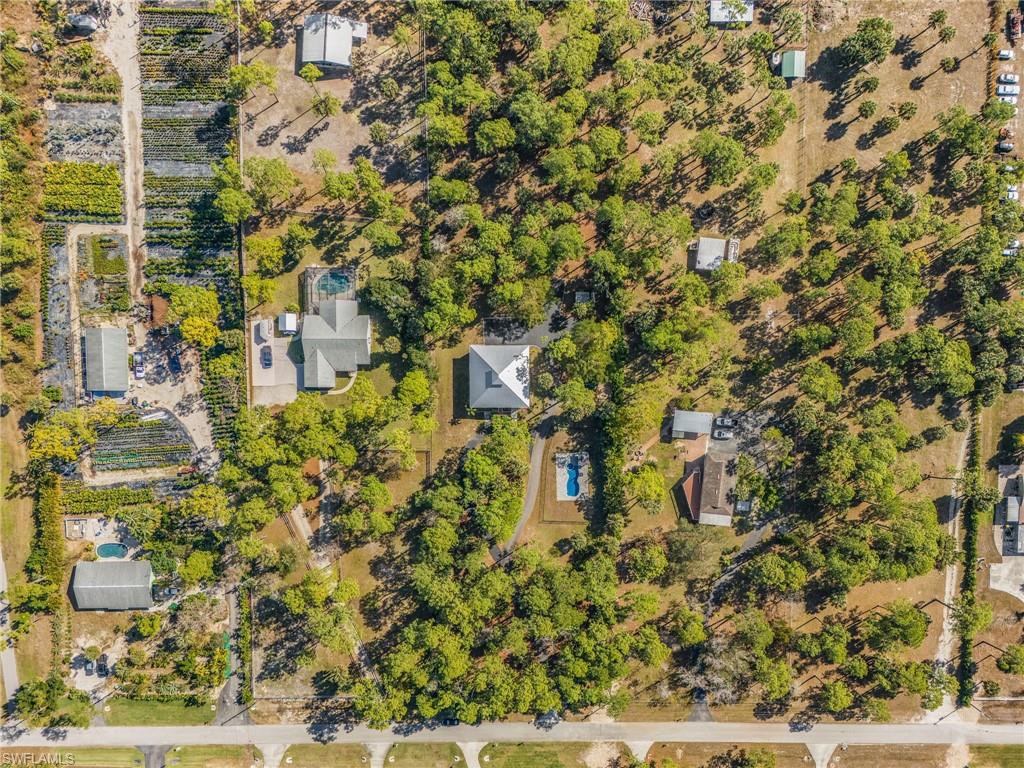 670 27th Street Northwest Naples, FL 34120 - Photo 35 of 39 view of a yard