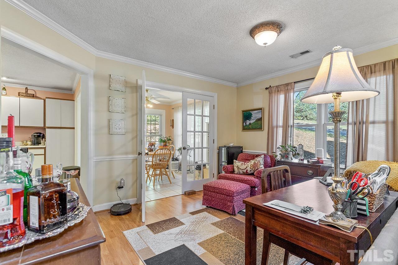 4200 Settlement Drive Durham, NC 27713 - Photo 18 of 32 a living room with furniture and a window