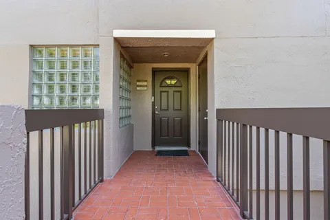 a view of a porch of a house