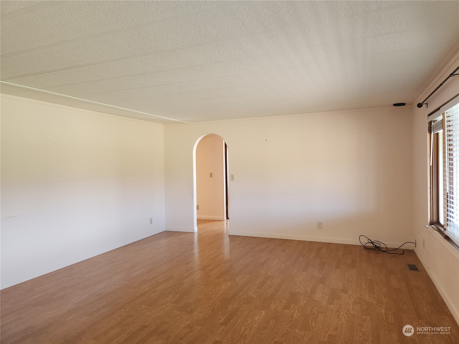 182 Engh Road Omak, WA 98841 - Photo 16 of 40 an empty room with a empty space and window