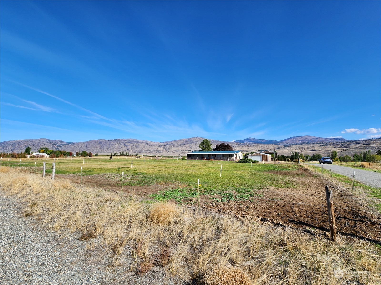 182 Engh Road Omak, WA 98841 - Photo 3 of 40 a view of an ocean and a mountain view