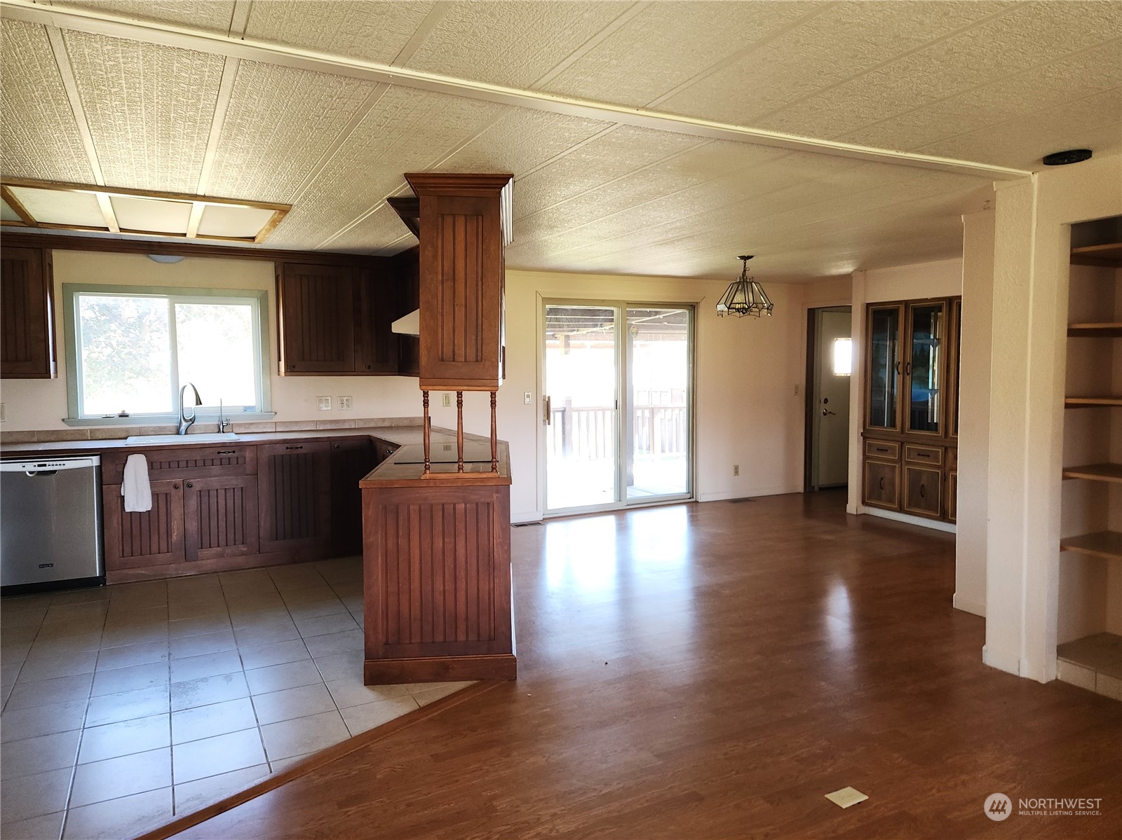 182 Engh Road Omak, WA 98841 - Photo 8 of 40 a kitchen with stainless steel appliances granite countertop a sink and cabinets