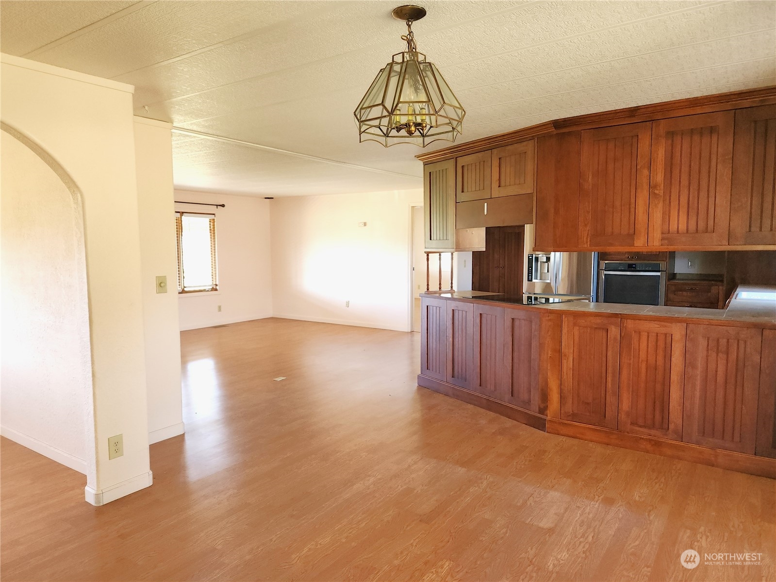 182 Engh Road Omak, WA 98841 - Photo 10 of 40 a view of a kitchen with a sink and cabinet area