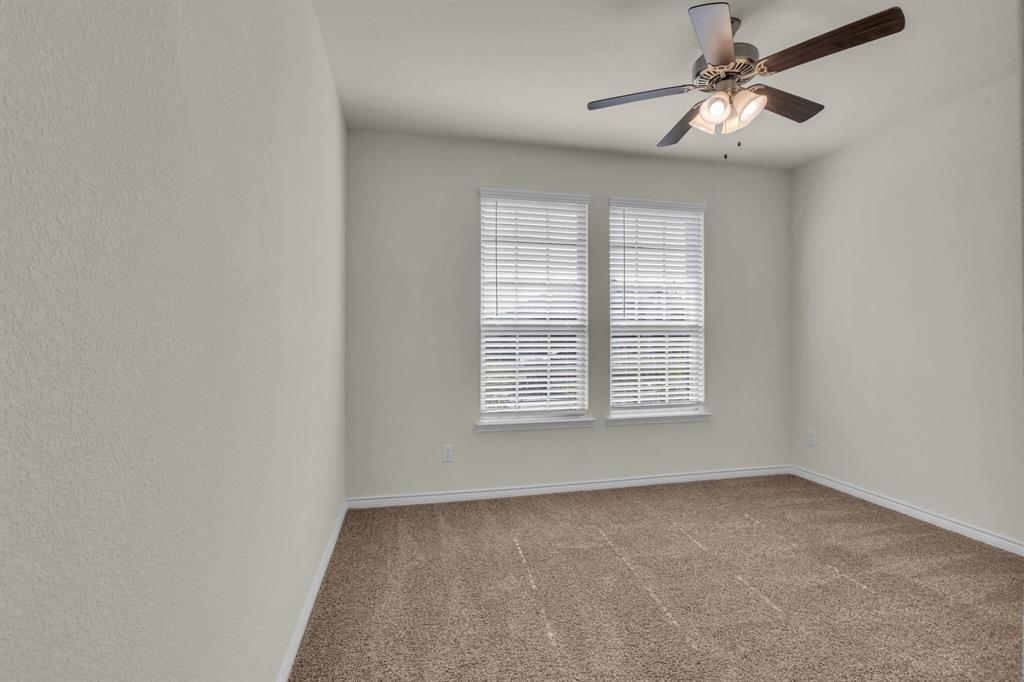 3106 Maverick Drive Forney, TX 75126 - Photo 18 of 32 a view of an empty room with a window