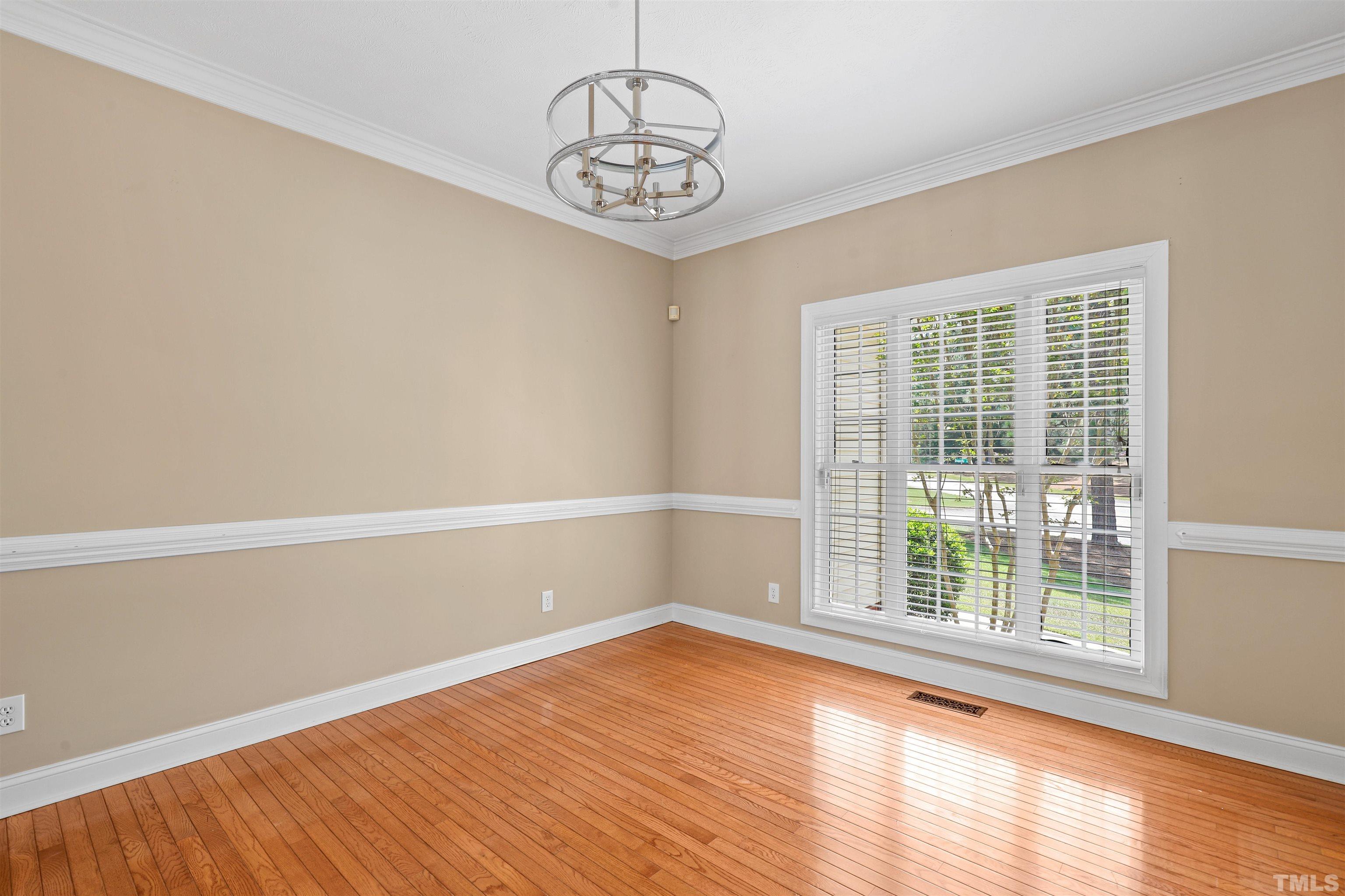 655 Elk Road Southern Pines, NC 28387 - Photo 3 of 45 a view of a room with wooden floor and a window