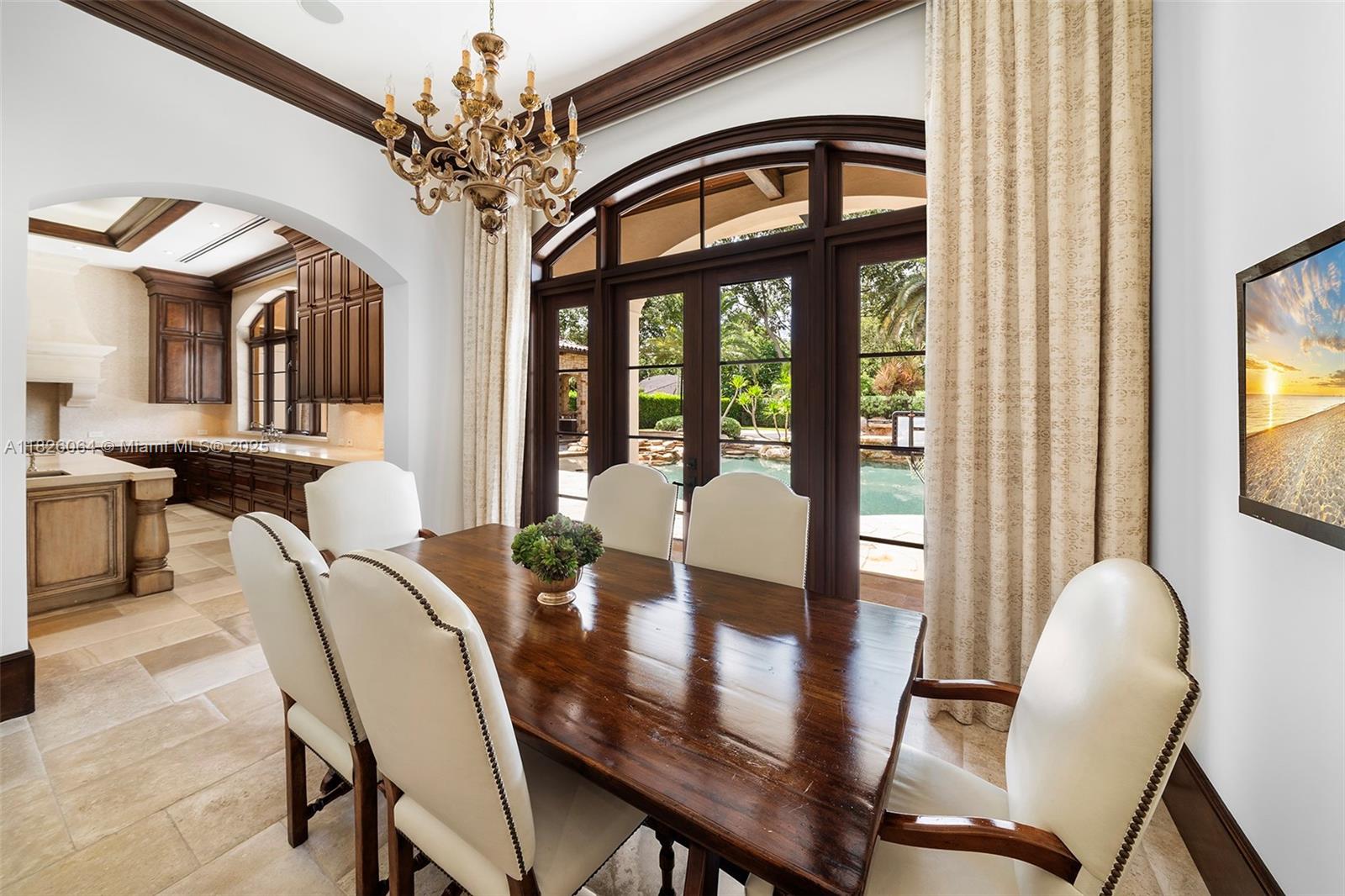 10101 Southwest 60th Court Pinecrest, FL 33156 - Photo 28 of 98 a view of a dining room with furniture window and outside view
