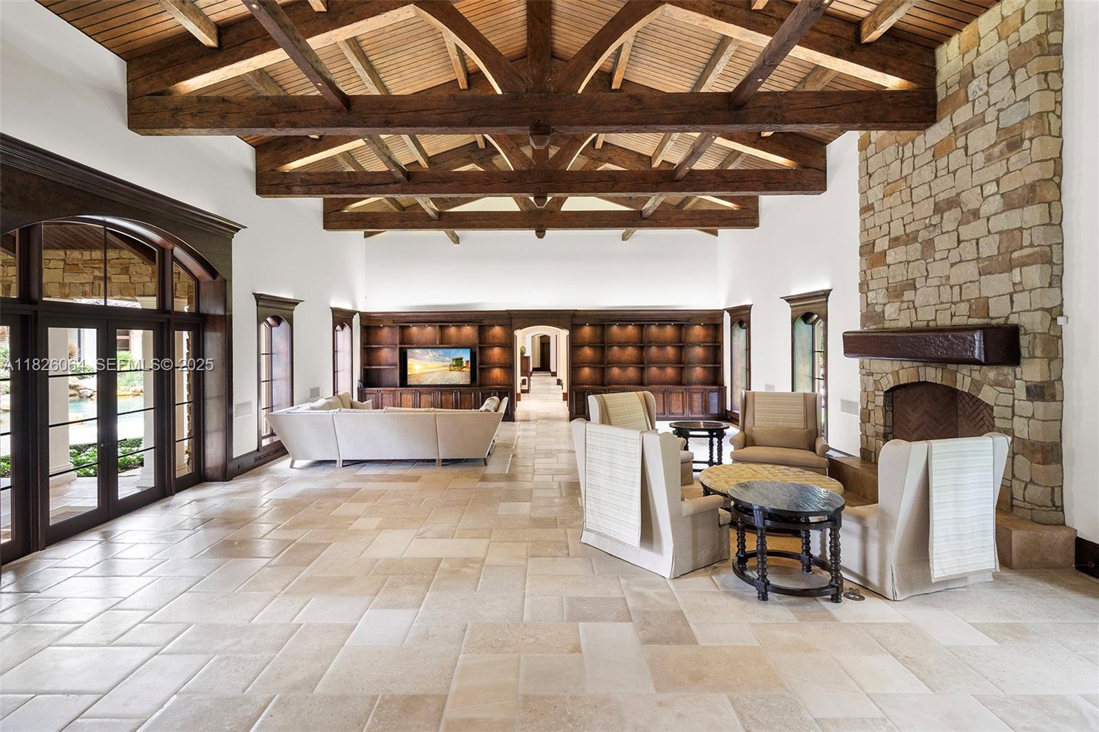 10101 Southwest 60th Court Pinecrest, FL 33156 - Photo 33 of 98 a view of a chairs and table in a patio