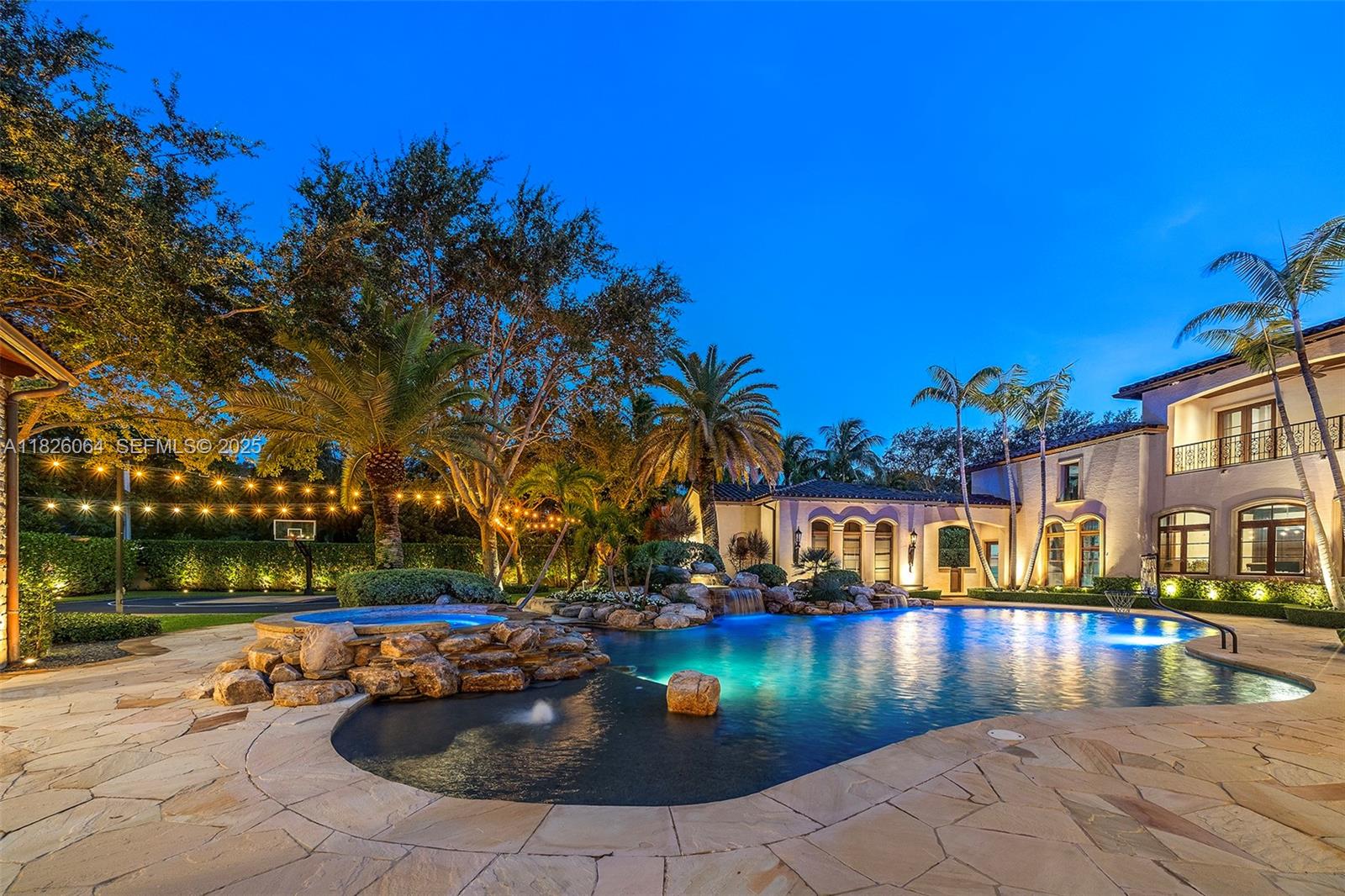 10101 Southwest 60th Court Pinecrest, FL 33156 - Photo 88 of 98 a view of swimming pool with outdoor seating and yard
