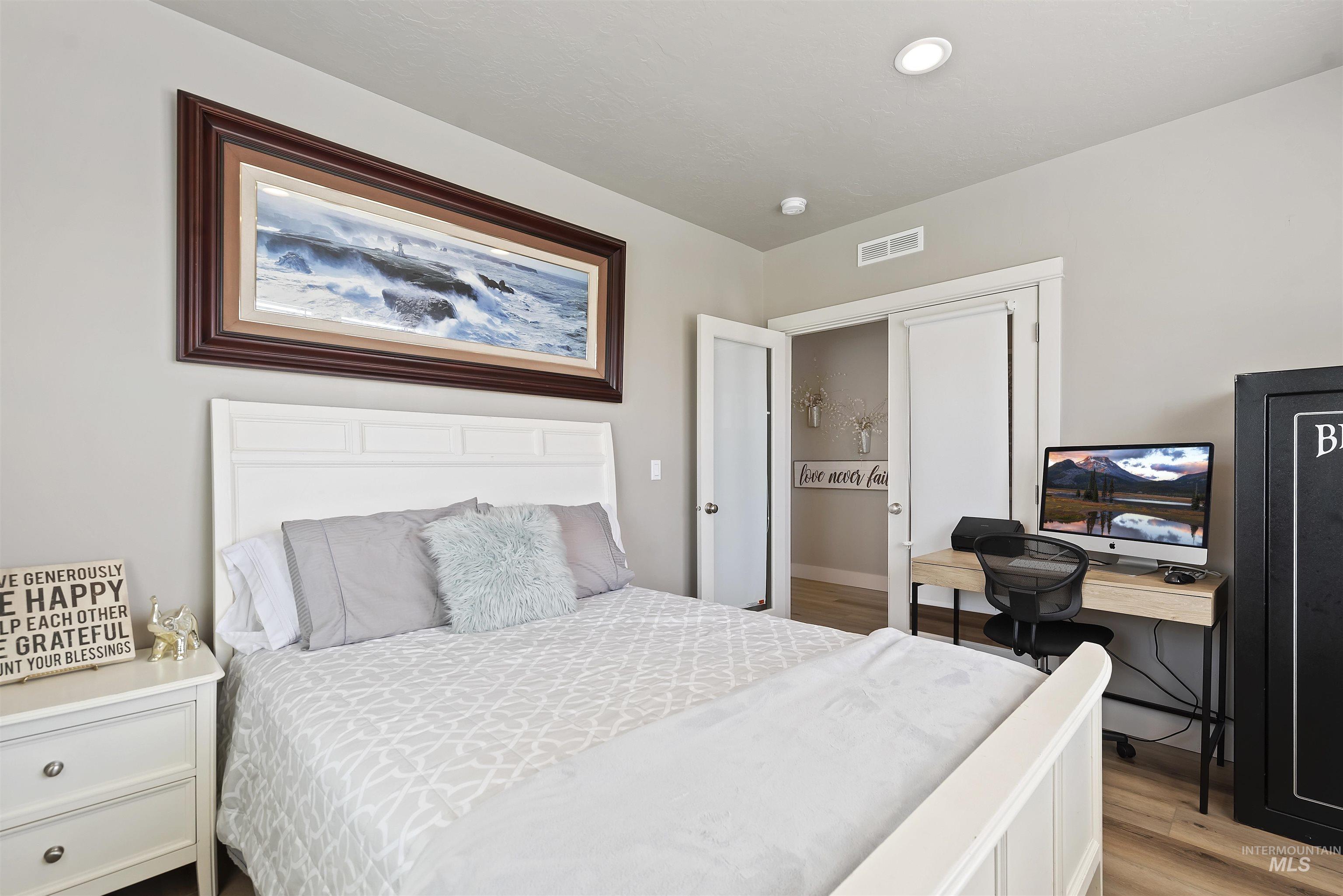 654 Diamond Lake Street Middleton, ID 83644 - Photo 20 of 36 Bedroom with light wood-style floors