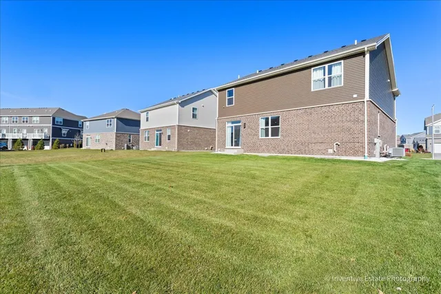 a big house with a big yard and more windows