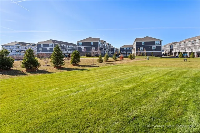 a view of houses with outdoor space and swimming pool