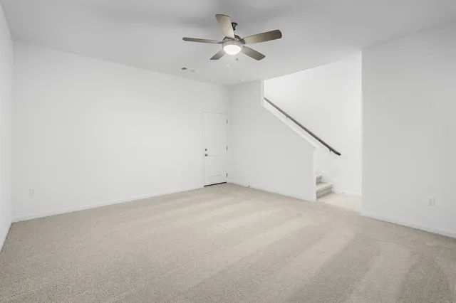 a view of a bathroom with a sink and a mirror
