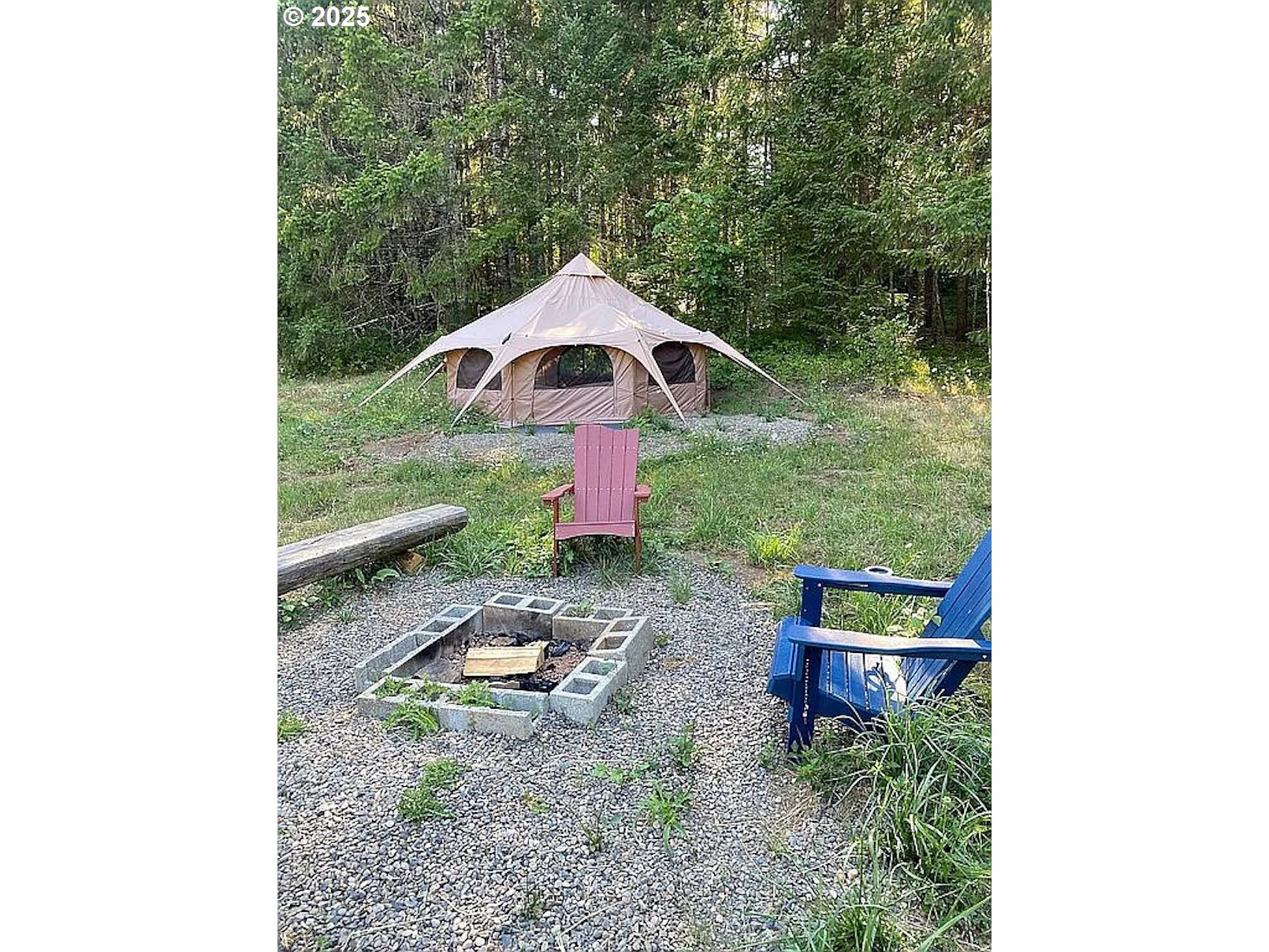 55778 Southwest Scoggins Valley Road Gaston, OR 97119 - Photo 21 of 42 a backyard of a house with table and chairs