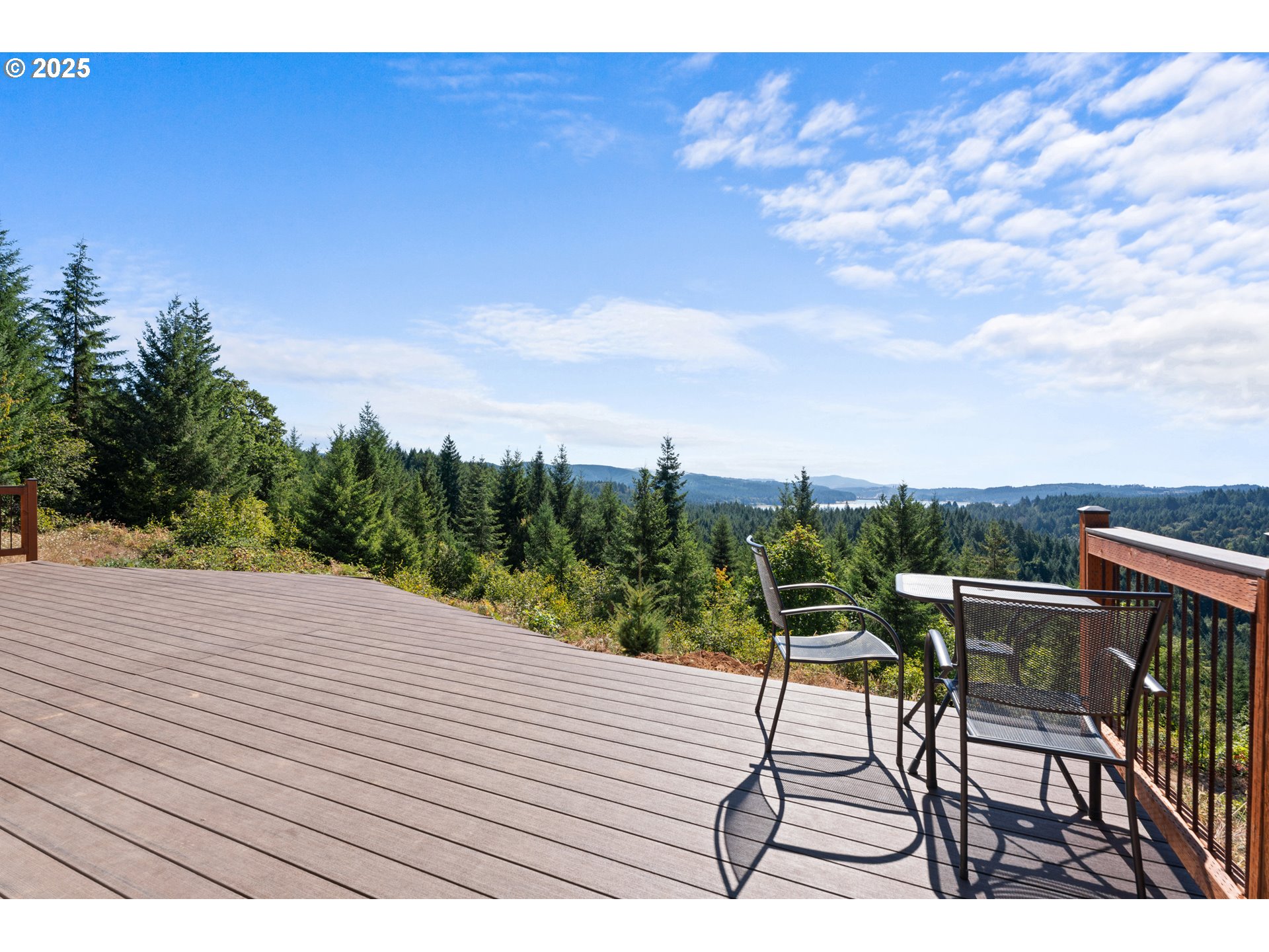 55778 Southwest Scoggins Valley Road Gaston, OR 97119 - Photo 29 of 42 a view of a terrace with furniture and a garden