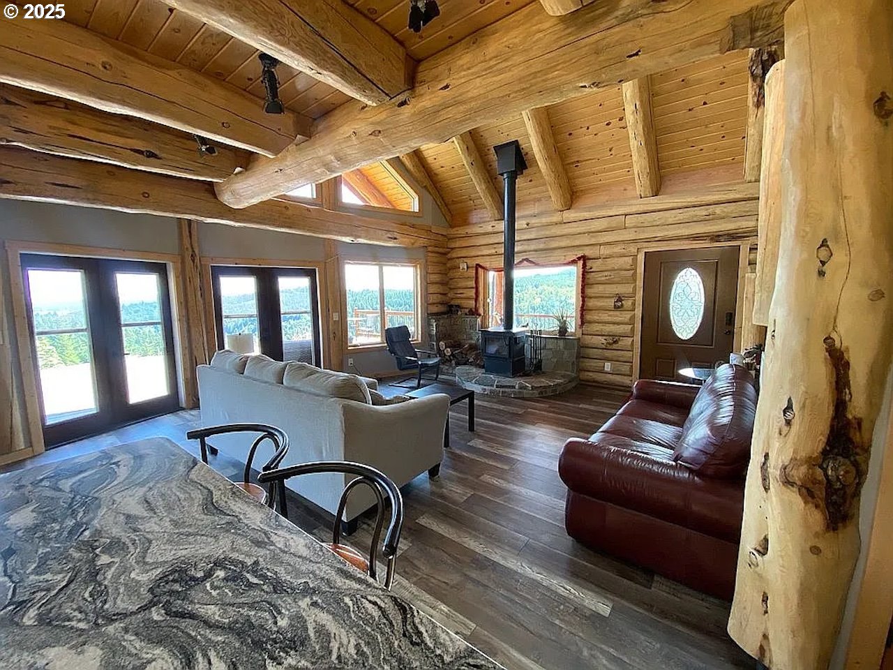 55778 Southwest Scoggins Valley Road Gaston, OR 97119 - Photo 4 of 42 a living room with furniture and wooden floor