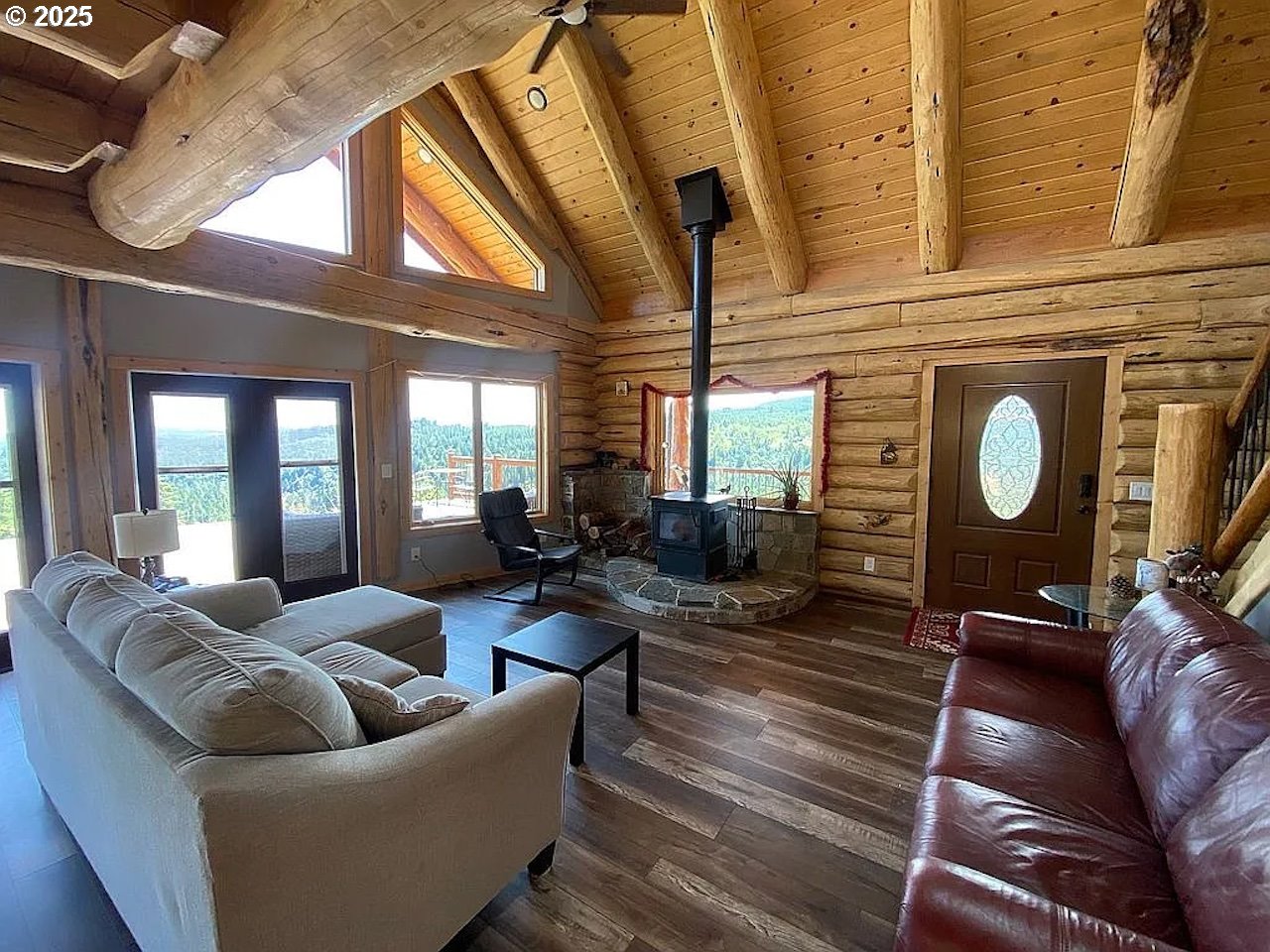 55778 Southwest Scoggins Valley Road Gaston, OR 97119 - Photo 6 of 42 a living room with furniture and a large window