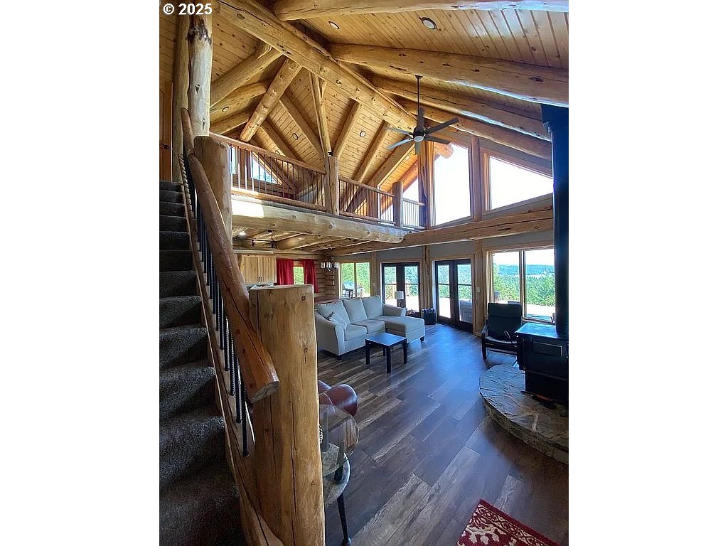 55778 Southwest Scoggins Valley Road Gaston, OR 97119 - Photo 7 of 42 a view of living room with a large window