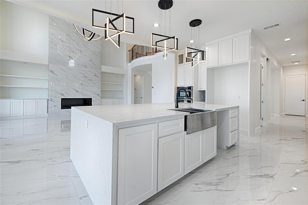 3611 Jacks Loop Midlothian, TX 76065 - Photo 13 of 39 a kitchen with white cabinets and window