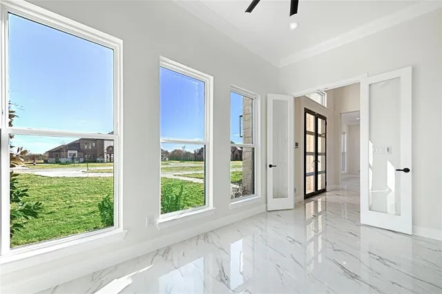a view of a room with a large window