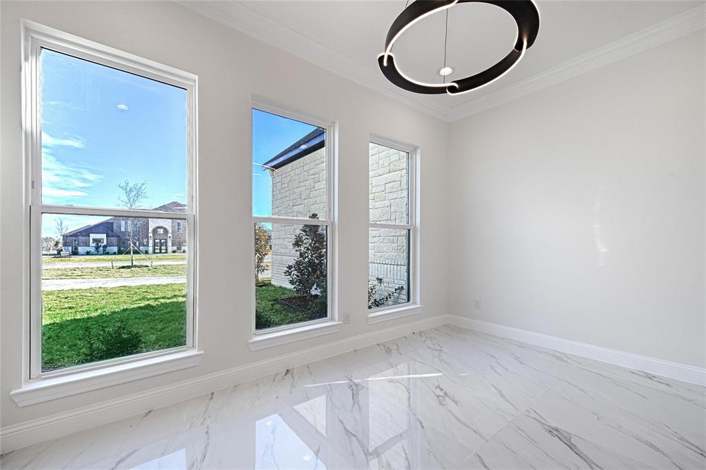 3611 Jacks Loop Midlothian, TX 76065 - Photo 6 of 39 a view of an empty room with wooden floor and a window
