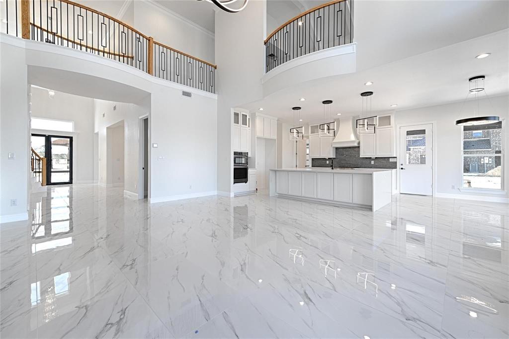 3611 Jacks Loop Midlothian, TX 76065 - Photo 10 of 39 a large kitchen with cabinets and wooden floor