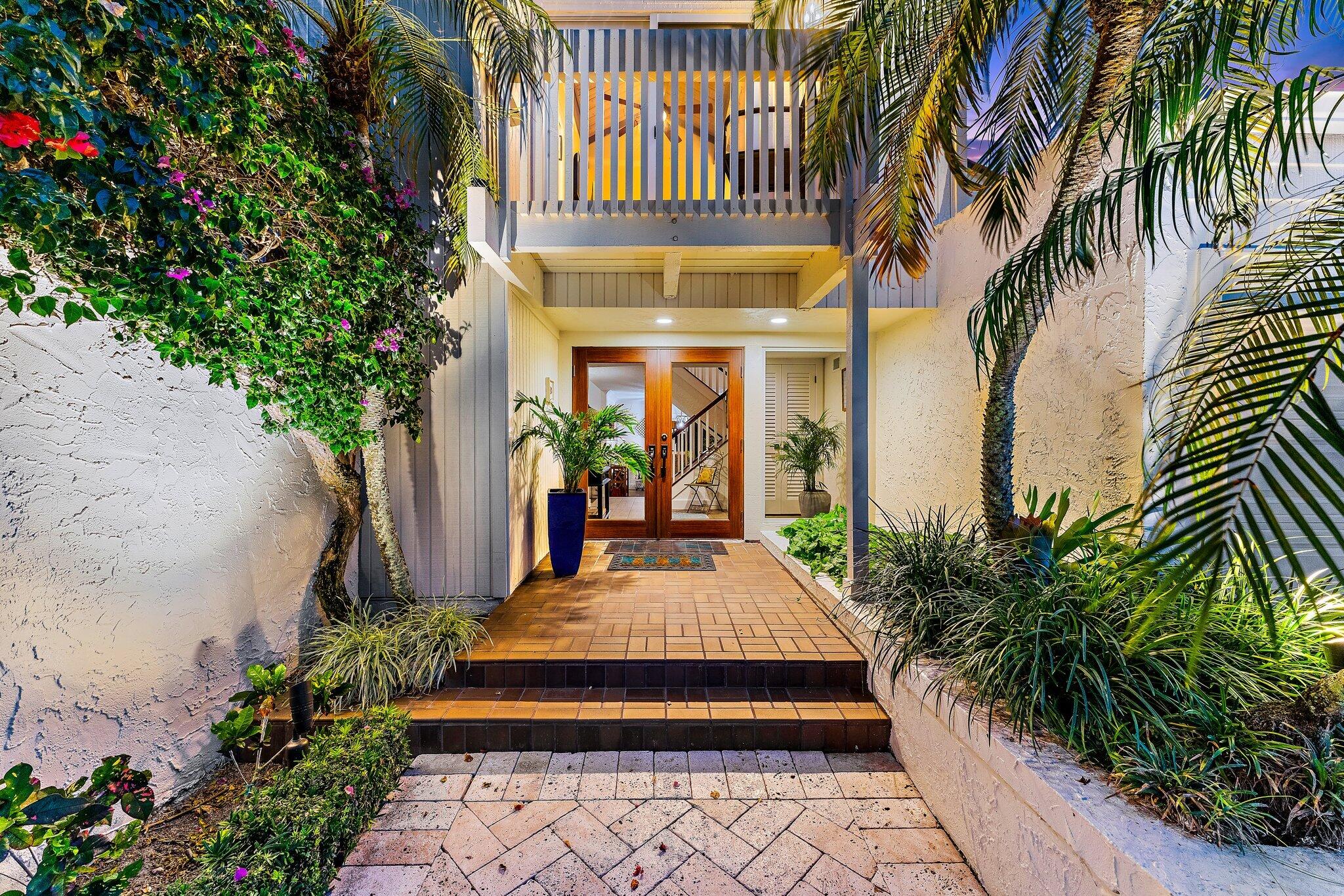 105 Albacore Lane Jupiter, FL 33477 - Photo 4 of 62 Entry view at night