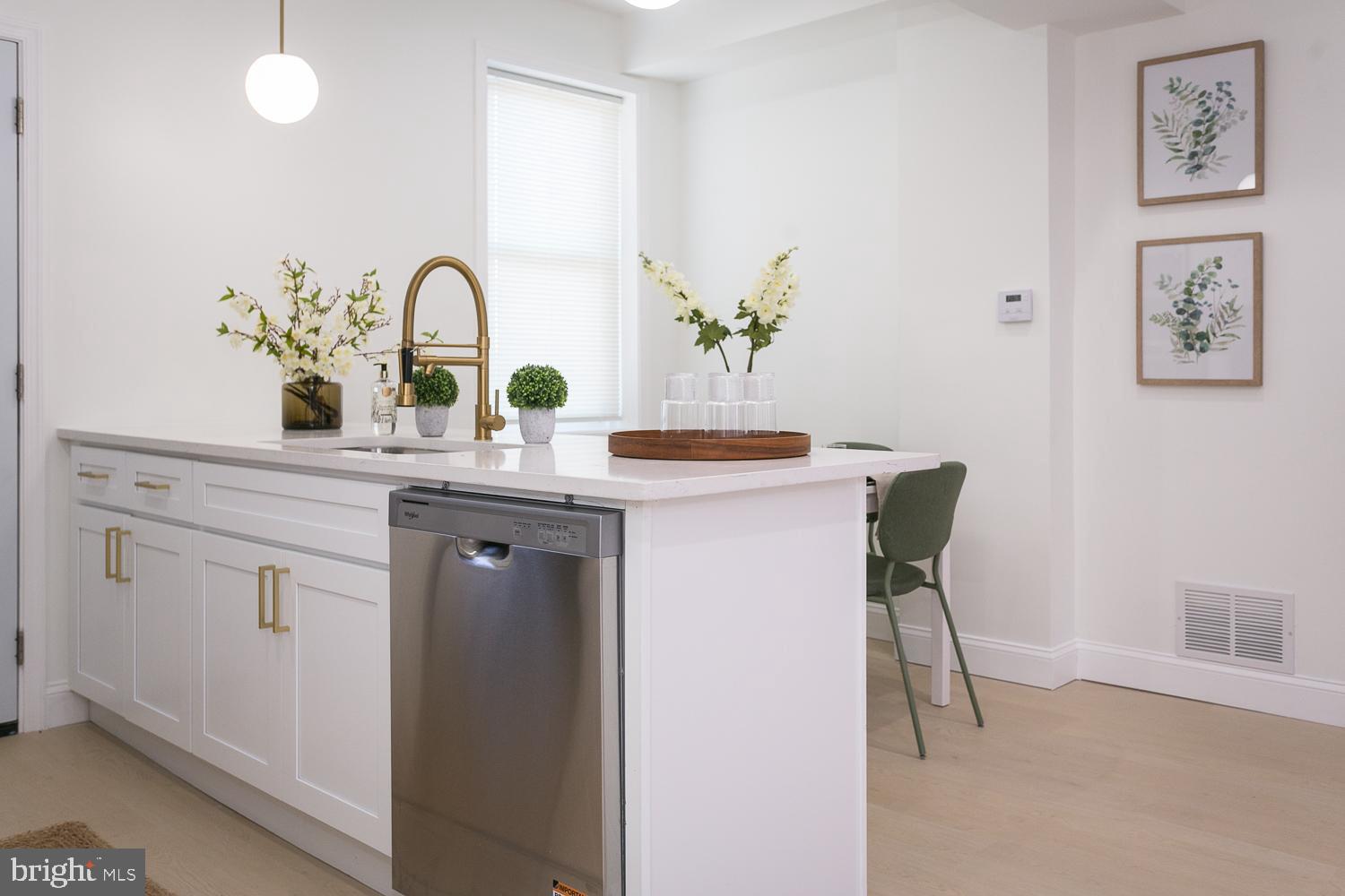 3729 Beehler Avenue Baltimore, MD 21215 - Photo 12 of 36 a close view of a sink dining table and chair