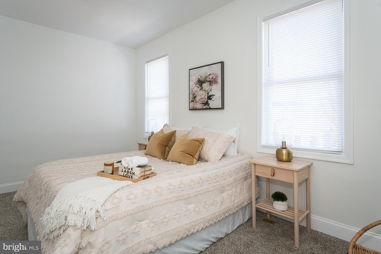 3729 Beehler Avenue Baltimore, MD 21215 - Photo 15 of 36 a bedroom with a bed and a window