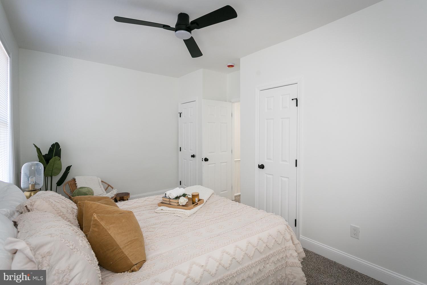 3729 Beehler Avenue Baltimore, MD 21215 - Photo 16 of 36 a bedroom with a bed and a window