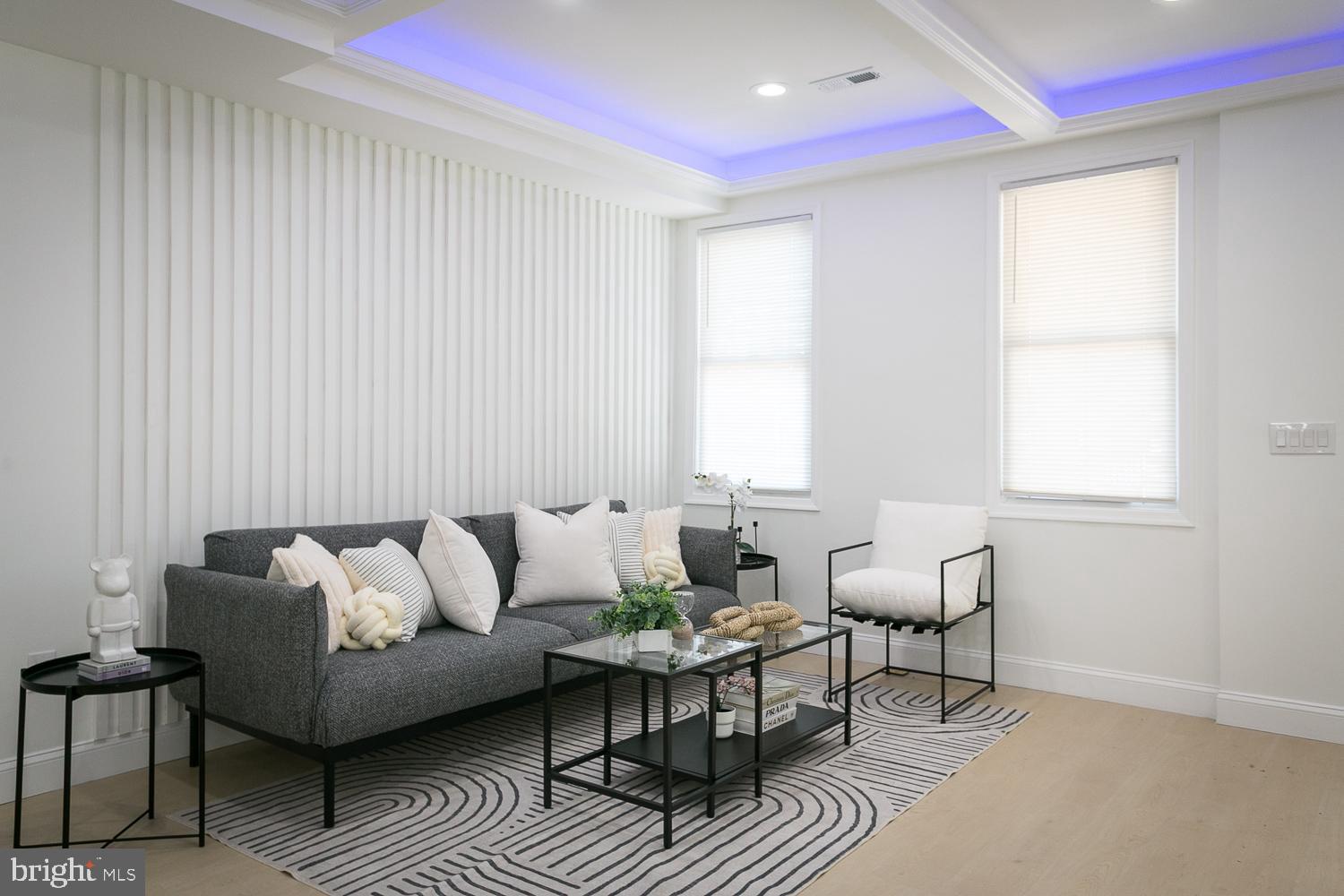 3729 Beehler Avenue Baltimore, MD 21215 - Photo 4 of 36 a living room with furniture and a window