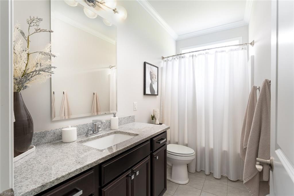 166 Windmill Trail High Point, NC 27265 - Photo 23 of 34 Additional hall bathroom with tub and shower.