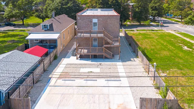 a aerial view of a house with swimming pool