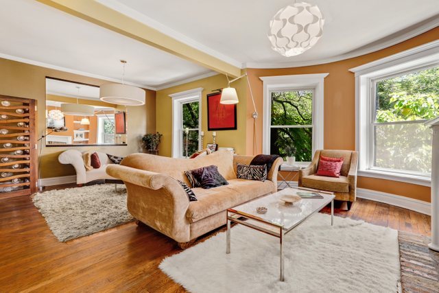 2000 North Howe Street, Unit 2S Chicago, IL 60614 - Photo 4 of 28 a living room with furniture large window and wooden floor