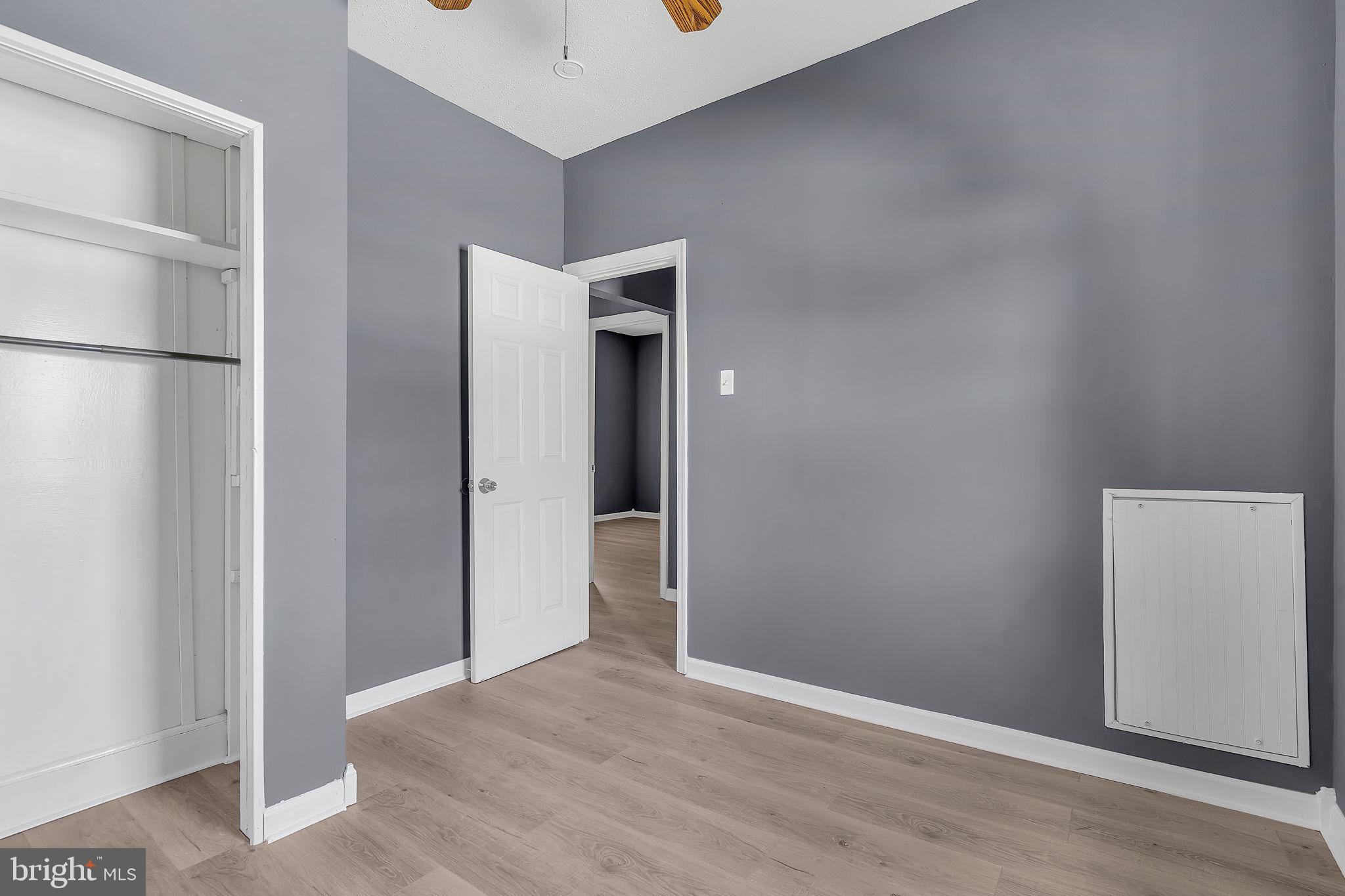 264 Birch Street Carneys Point, NJ 08069 - Photo 14 of 29 Modern space with sleek gray walls.