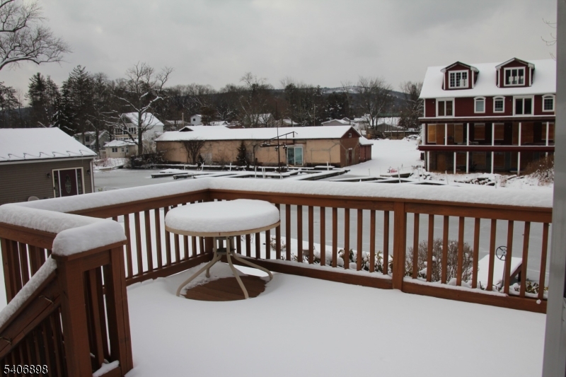 31 Ringwood Lane Hewitt, NJ 07421 - Photo 11 of 16 a view of a chairs and table on the roof deck