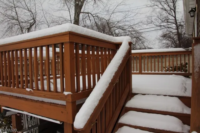 a view of balcony with wooden floor