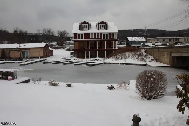 a view of a parking space covered with snow