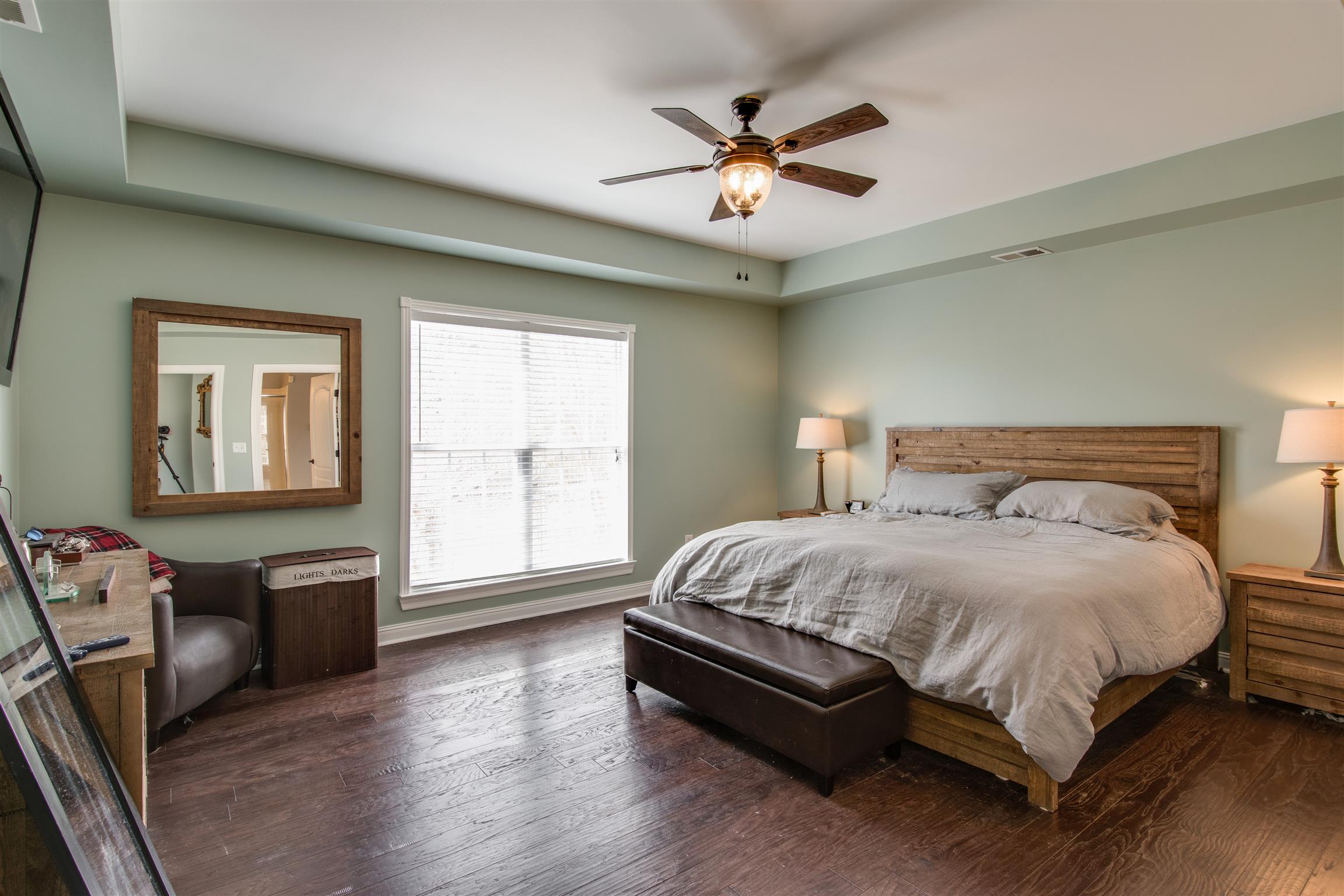 3181 Vera Valley Road Franklin, TN 37064 - Photo 15 of 26 a bedroom with a bed and wooden floor