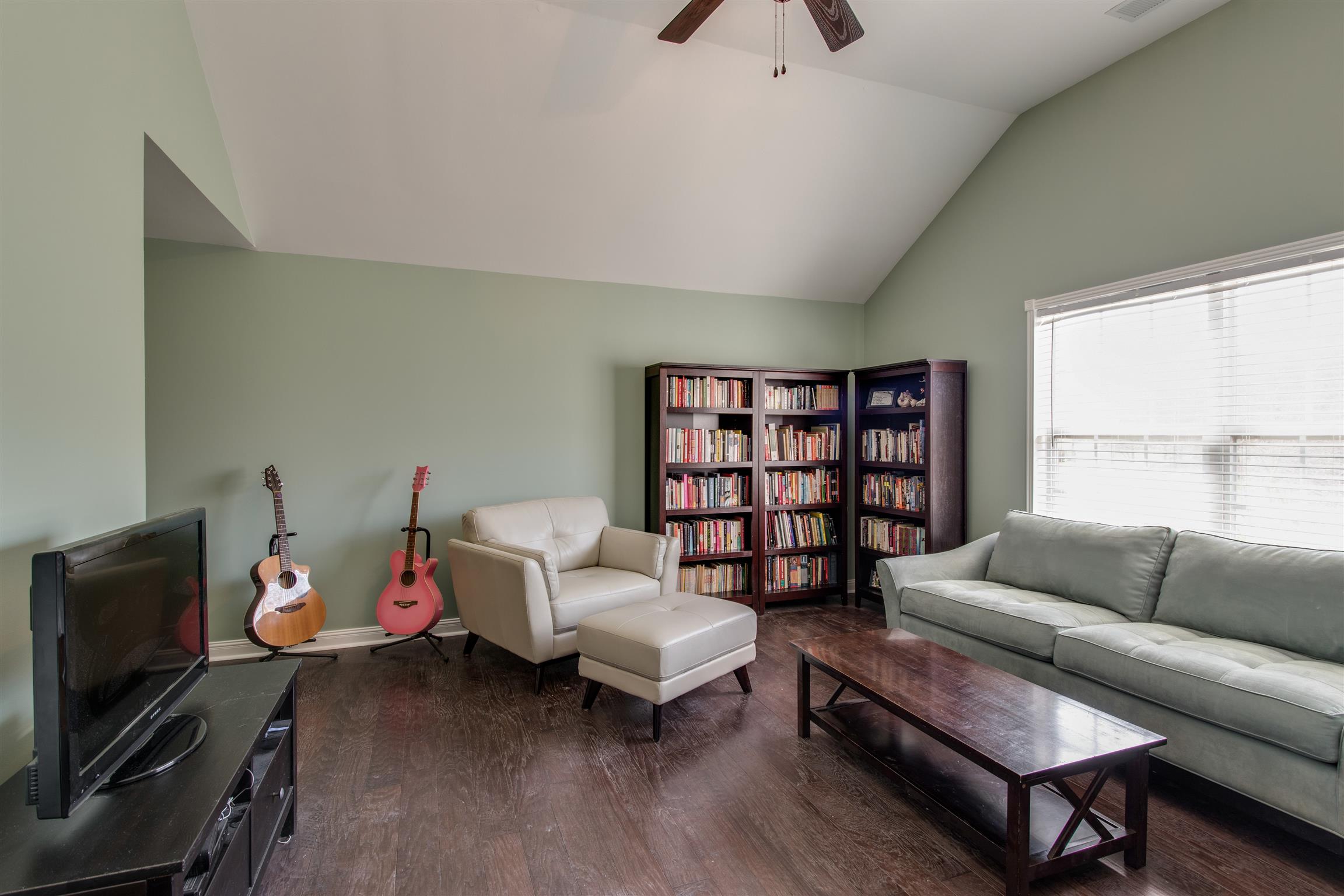 3181 Vera Valley Road Franklin, TN 37064 - Photo 23 of 26 a living room with furniture and a flat screen tv