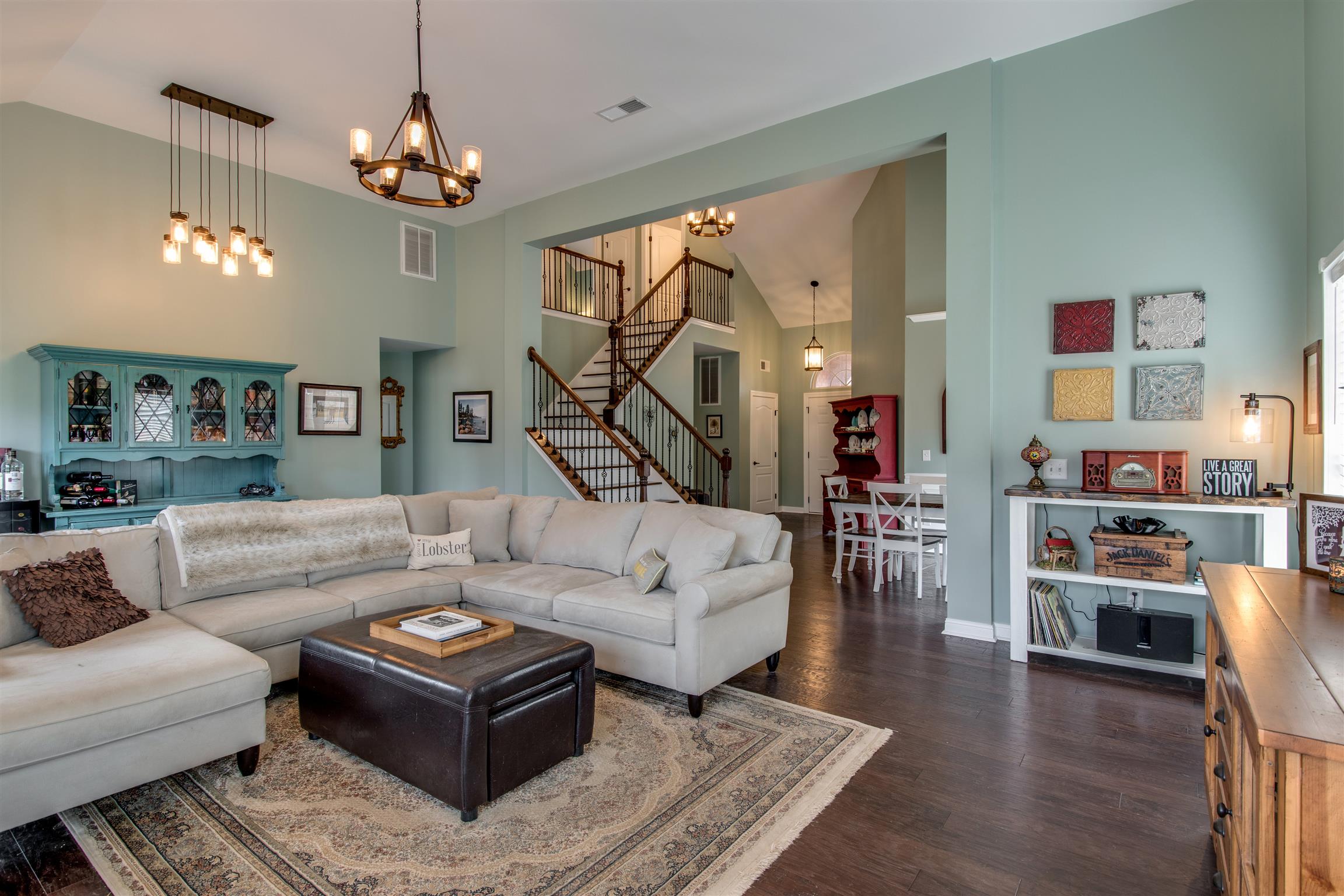 3181 Vera Valley Road Franklin, TN 37064 - Photo 8 of 26 a living room with furniture or chandelier and a wooden floor
