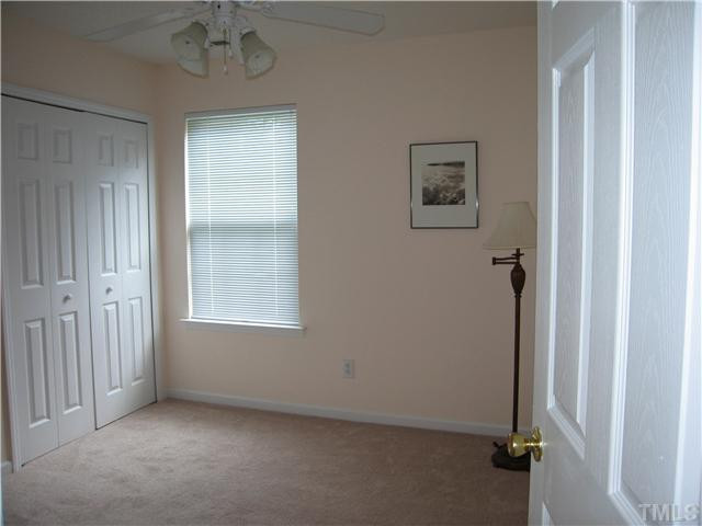 4906 Gable Ridge Drive Durham, NC 27713 - Photo 13 of 24 Middle Bedroom. NEW CARPET. Good closet space. Cordless Blinds and Ceiling Fan. Bedroom