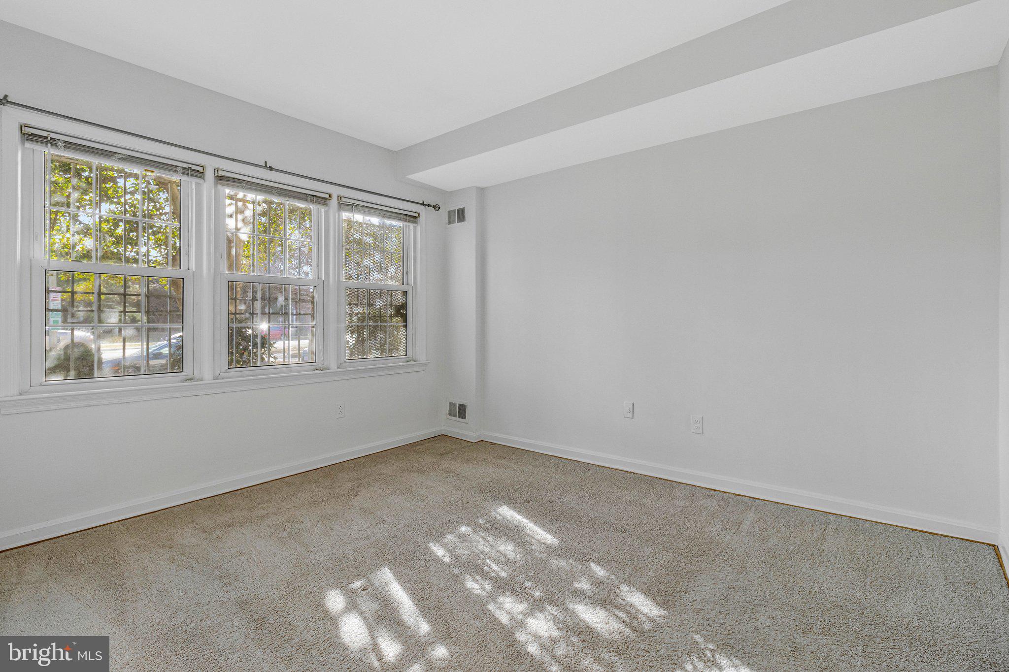 1248 C Street Southeast, Unit A Washington, DC 20003 - Photo 8 of 15 a view of an empty room with a window